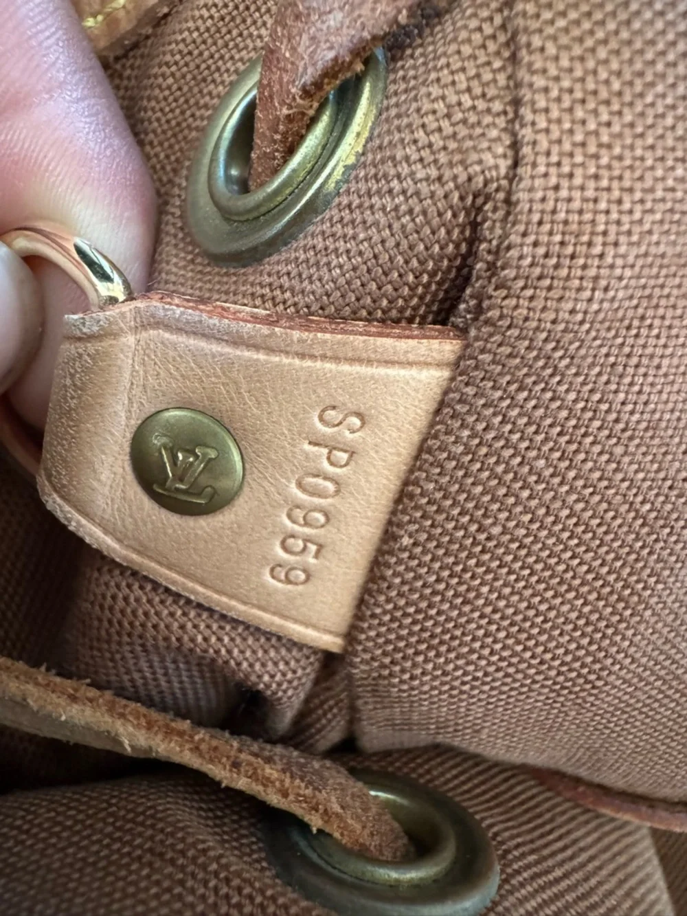 Louis Vuitton Monogram Canvas Backpack in Brown with Tan Trim